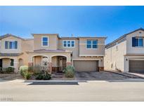 Charming two-story home with a well-manicured front yard and a two-car garage at 183 Baru Belin Ave, Las Vegas, NV 89183