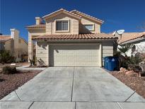 Charming two-story home with a two car garage and concrete driveway at 3751 Morning Canyon St, Las Vegas, NV 89147