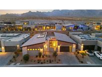 Stunning desert home with modern design, professional landscaping, mountain views, and ample parking at 803 Bolide St, Las Vegas, NV 89138