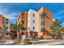 Modern exterior view of community building with landscaping and unique architectural details at 19 E Agate Ave # 406, Las Vegas, NV 89123