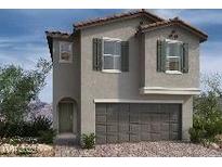 Charming two-story home featuring gray stucco, a two-car garage, and well-placed windows at 6598 Tumoulin St, Las Vegas, NV 89148