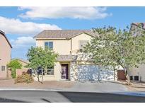 Charming two-story home with a well-maintained lawn and a two-car garage at 8112 Mustang Hill Ct, Las Vegas, NV 89131