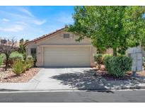 Charming one-story home with a desert landscape and covered front entrance at 2137 Hidden Ranch Ter, Henderson, NV 89052