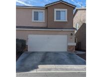 Charming two-story home with a two-car garage and driveway at 3681 Hidden Beach Ct, Las Vegas, NV 89115
