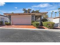 Charming single-story home with a two-car garage and well-maintained landscaping at 2108 Plaza Del Dios, Las Vegas, NV 89102