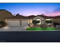 Charming single-story home featuring a three-car garage and well-manicured landscaping at 283 Parisian Springs Ct, Las Vegas, NV 89148