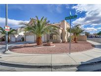 Charming two-story home featuring desert landscaping, a multi-car garage, and a stucco exterior at 7973 Macklin St, Las Vegas, NV 89129