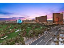 Striking Las Vegas view overlooking a golf course and The Sphere at sunrise at 360 E Desert Inn Rd # 1903, Las Vegas, NV 89109