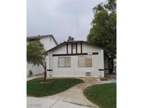 Charming single-story home with a tidy front yard and neutral exterior color scheme at 1936 St Lawrence Dr, Las Vegas, NV 89108