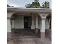 Charming front entrance with covered porch and stylish architectural details at 3908 Montebello Ave, Las Vegas, NV 89110