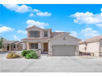 Charming two-story home featuring a spacious driveway and well-maintained front yard landscaping at 6817 Frances Celia Ave, Las Vegas, NV 89122