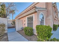 Charming home featuring stucco siding, a tile roof, and manicured landscaping at 8425 Sewards Bluff Ave, Las Vegas, NV 89129