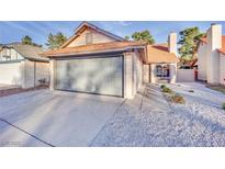 Charming single-story home with a two-car garage and low maintenance rock landscaping at 163 Spinnaker Dr, Henderson, NV 89015