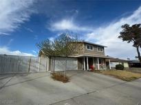 Two story home with a large driveway and two car garage at 4262 Tarkin Ave, Las Vegas, NV 89120