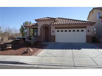 Charming single-story home with a well-manicured front yard and tile roof at 7929 Palace Monaco Ave, Las Vegas, NV 89117