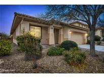 Charming single-story home with desert landscaping and a two-car garage at 11069 Crystal Crest Ct, Las Vegas, NV 89135