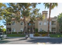 Charming condo with a landscaped yard, mature trees, and convenient parking at 3145 E Flamingo Rd # 2119, Las Vegas, NV 89121