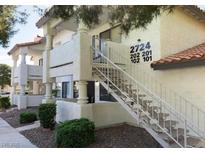 Apartment building featuring outdoor stairways leading to upper-level units at 2724 Otter Creek Ct # 101, Las Vegas, NV 89117