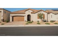 Charming single-story home showcasing a well-maintained lawn, a two car garage and tile roof at 6225 Gambetta St, Las Vegas, NV 89115