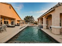 Inviting backyard pool with lounge area, perfect for relaxing and entertaining guests at 1259 N Hollywood Blvd, Las Vegas, NV 89110