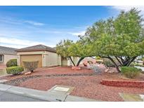 Charming single-story home with a well-manicured desert landscape at 2526 Evansville Ave, Henderson, NV 89052