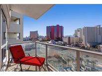 Balcony view showcasing the city skyline from a high-rise condo, with seating available to enjoy the vistas at 2700 Las Vegas Blvd # 1202, Las Vegas, NV 89109