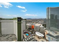 This high-angle shot of Park MGM and NoMad highlights the stunning pool and Vegas skyline at 3750 Las Vegas Blvd # 2711, Las Vegas, NV 89158