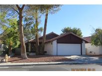 Charming single-story home featuring a two-car garage and low-maintenance landscaping at 8512 Manalang Rd, Las Vegas, NV 89123