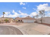 Charming single-story home with a two-car garage and a well-maintained front yard at 1163 Teal Point Dr, Henderson, NV 89074