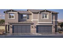 Charming townhome featuring a neutral color scheme and two-car garage for modern living at 204 Biscotti Ave # Lot 123, North Las Vegas, NV 89084