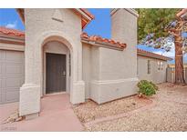 Charming home featuring a stucco exterior, red tile roof and an arched front entrance at 2218 Ramsgate Dr # 0, Henderson, NV 89074