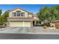 Charming two-story home with a three-car garage and desert landscaping at 2236 Midvale Ter, Henderson, NV 89074