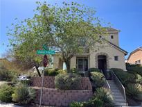 Charming two-story home featuring a landscaped front yard and inviting entrance at 2461 Brooklyn Bridge St, Las Vegas, NV 89135