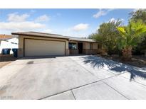 Charming single story home with desert landscaping and a large driveway at 2637 Rialto Rd, Las Vegas, NV 89108