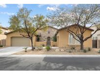 Charming single-story home with stone accents, desert landscaping, and a welcoming entrance at 7307 Iron Oak Ave, Las Vegas, NV 89113