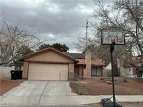 Charming single-story home featuring a spacious driveway and a basketball hoop for outdoor fun at 2356 Belvedere Dr, Henderson, NV 89014