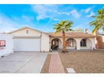Charming single-story home with a well-manicured lawn, desert landscaping, and inviting curb appeal at 3661 Margarita Way, Las Vegas, NV 89103