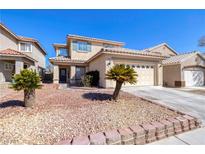Charming home with desert landscaping, a two-car garage, and a covered front porch at 7836 Pinnochio Ave, Las Vegas, NV 89131