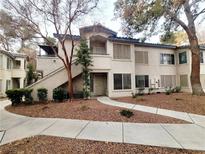 Inviting condo with well-maintained landscaping, featuring a private entrance and neutral toned stucco at 3083 Casey Dr # 101, Las Vegas, NV 89120