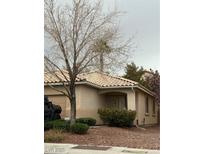 Charming single-story home with desert landscaping and a tile roof at 11040 Napa Ridge Dr, Las Vegas, NV 89144