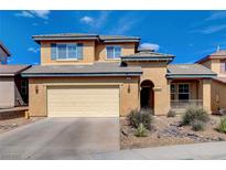 Charming two-story home with a two-car garage and well-maintained front yard at 112 Austin Rose Ave, Henderson, NV 89002