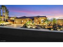 Charming single-story home boasts a three-car garage and meticulously landscaped front yard at 2491 Hardin Ridge Dr, Henderson, NV 89052