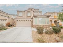 Charming two-story home features a well-manicured front yard, and inviting curb appeal at 8890 Bonneville Peak Ct, Las Vegas, NV 89148