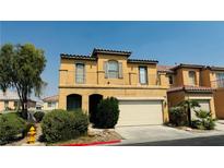 Inviting two-story home featuring a neutral color palette, low maintenance landscaping and an attached two car garage at 836 Sheerwater Ave, Henderson, NV 89052