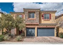 Charming two-story home with a stone facade, two-car garage, and low-maintenance landscaping at 92 Tesla Ridge Way, Las Vegas, NV 89183