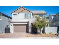 Charming two-story home with a two car garage and a manicured front yard at 2514 Spergola St, Henderson, NV 89044