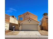 Charming two-story home featuring a two-car garage and neutral color palette in a well-maintained neighborhood at 4064 Browndeer Cir, Las Vegas, NV 89129