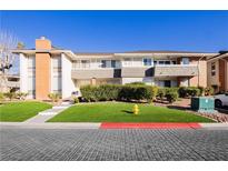 Charming two-story condo with well-manicured lawn and mature landscaping at 737 Oakmont Ave # 1202, Las Vegas, NV 89109