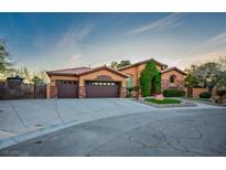 Charming single-story home with a well-manicured lawn, mature trees, and a two-car garage at 7685 Gilespie St, Las Vegas, NV 89123