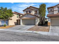 Charming two-story home featuring a tile roof and a spacious two-car garage at 9526 Vast Valley Ave, Las Vegas, NV 89148